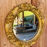 Small round antique gold mirror