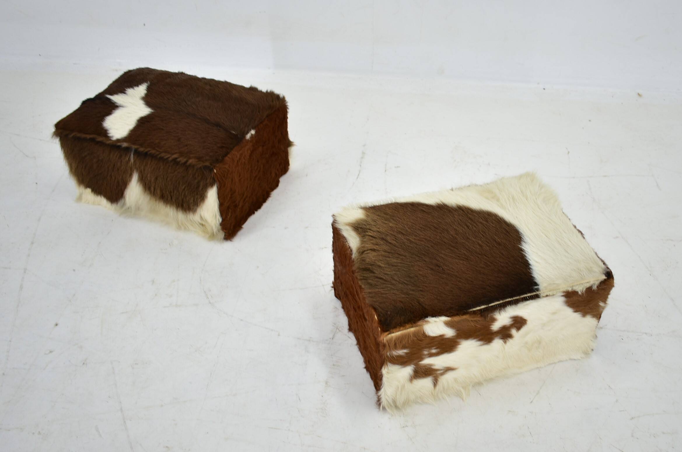 red brown leather cowhide footstools , poufs, 80s