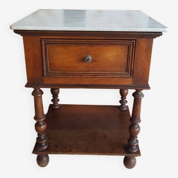Old wooden marble bedside table