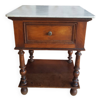 Old wooden marble bedside table