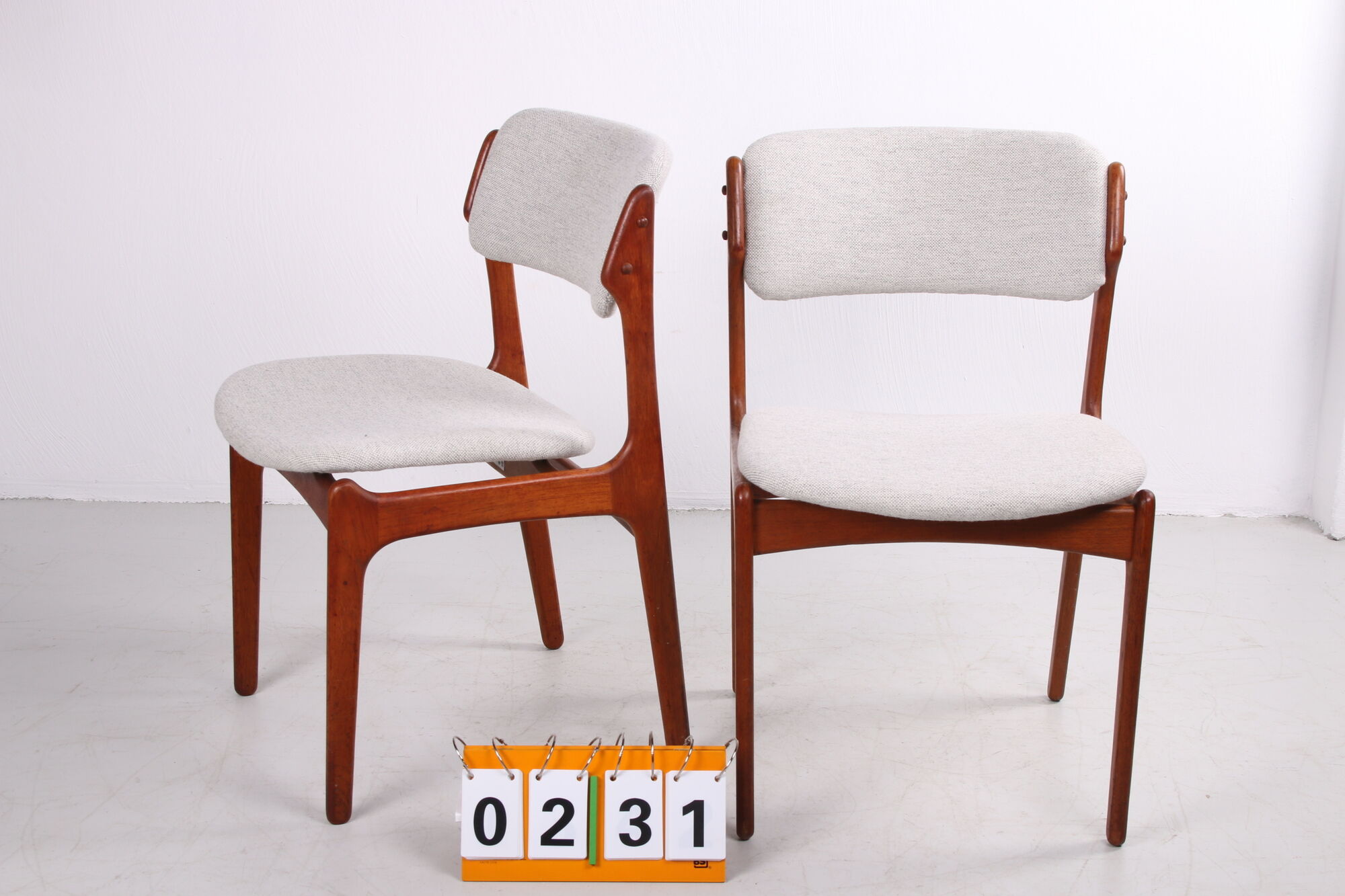 Teak dining room chairs by Erik Buch for Odense Maskinsnedkeri / O.D. Møbler model 49, 1960s