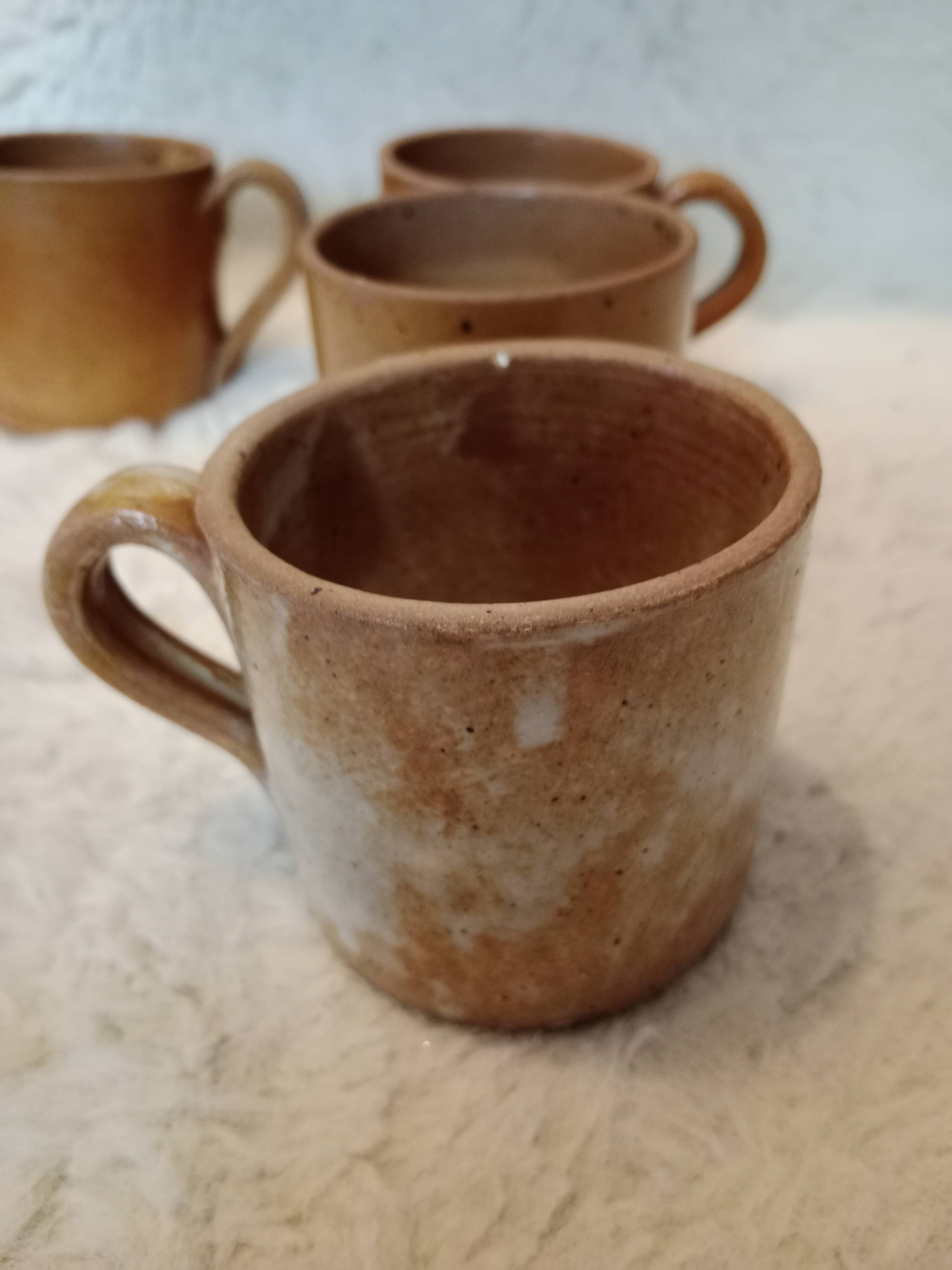 Vintage mismatched stoneware mugs