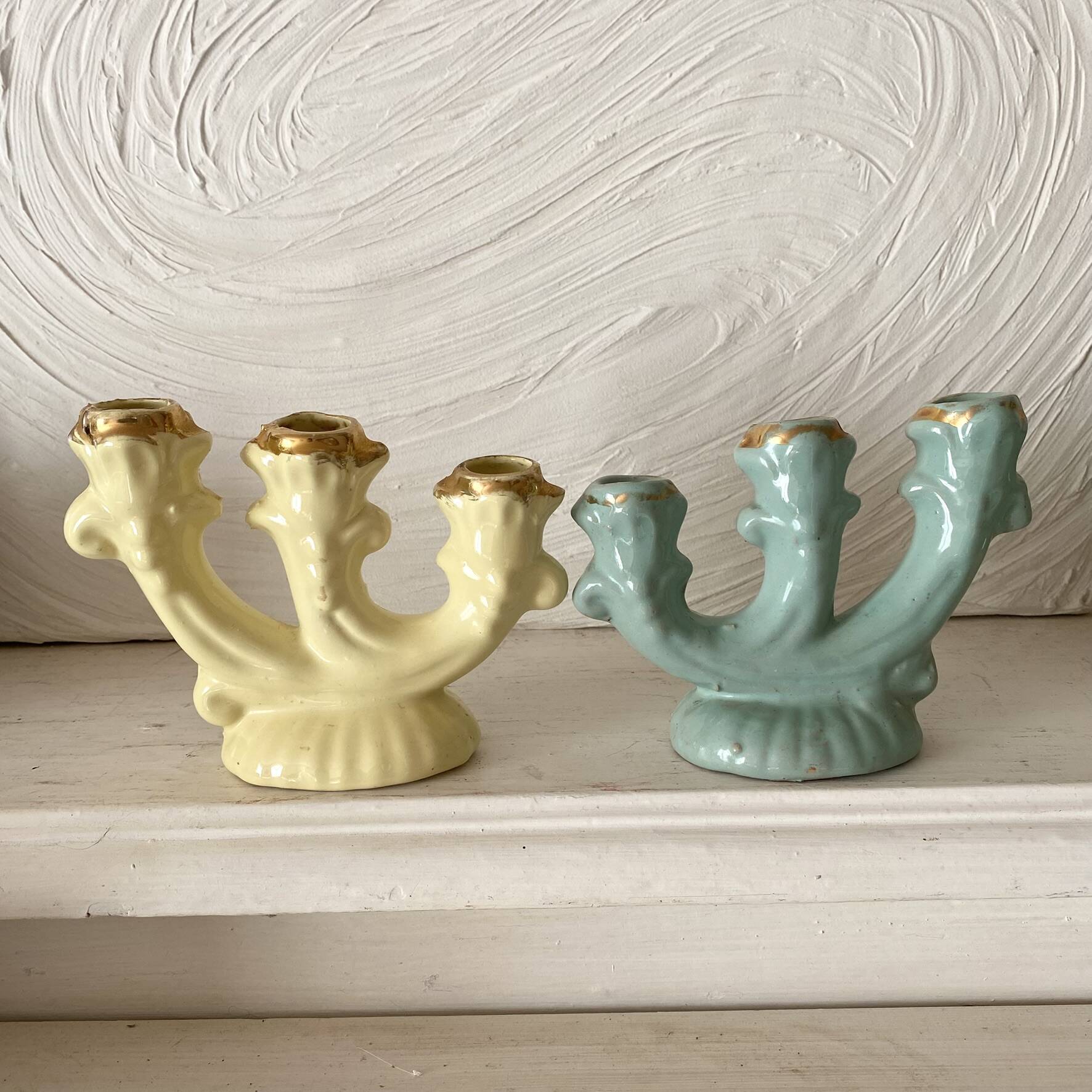 Pastel-toned earthenware candle holders