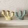 Pastel-toned earthenware candle holders