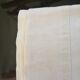 Linen cloth with monogram.