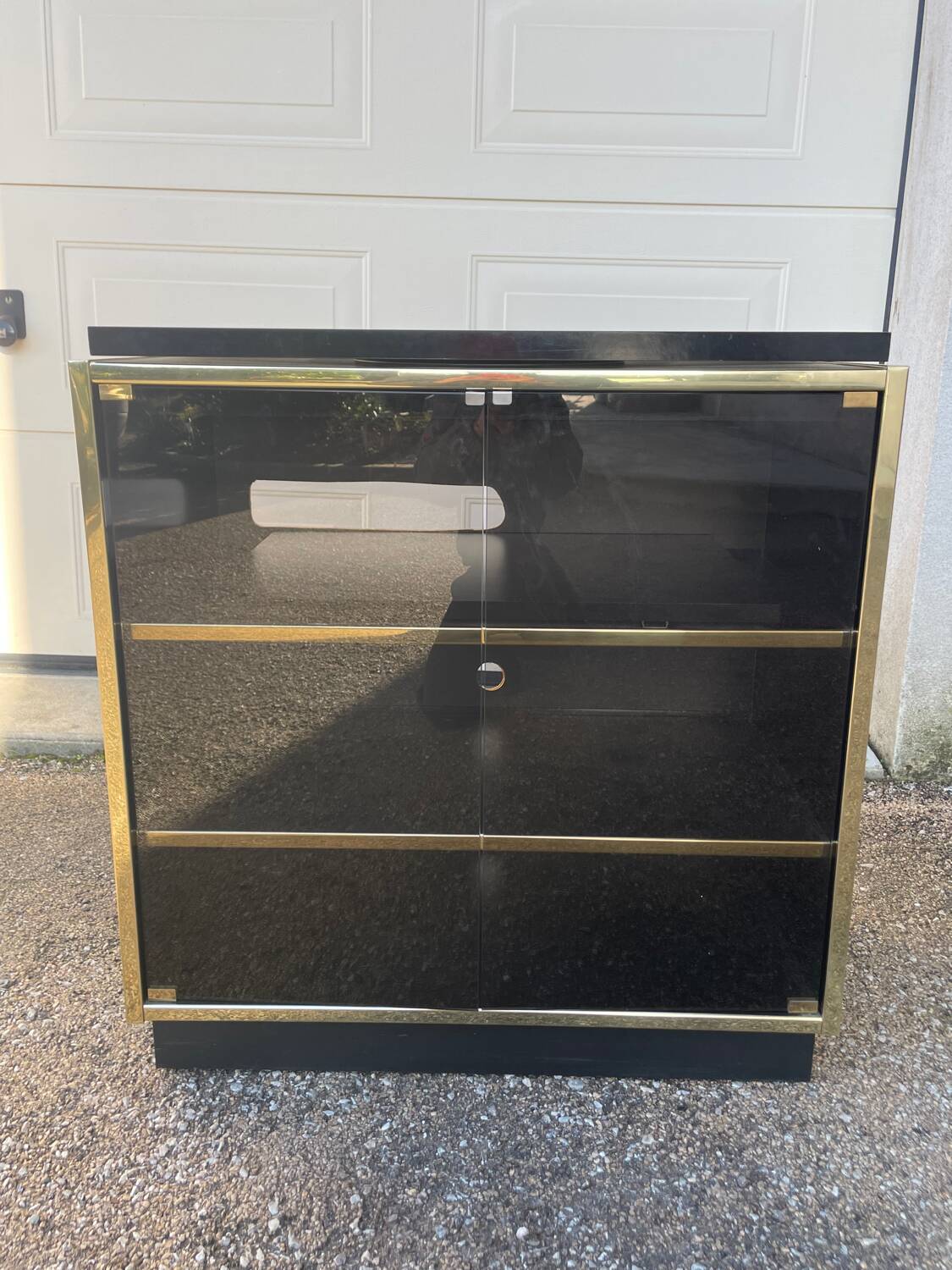 Vintage black and gold TV cabinet from the 70s/80s