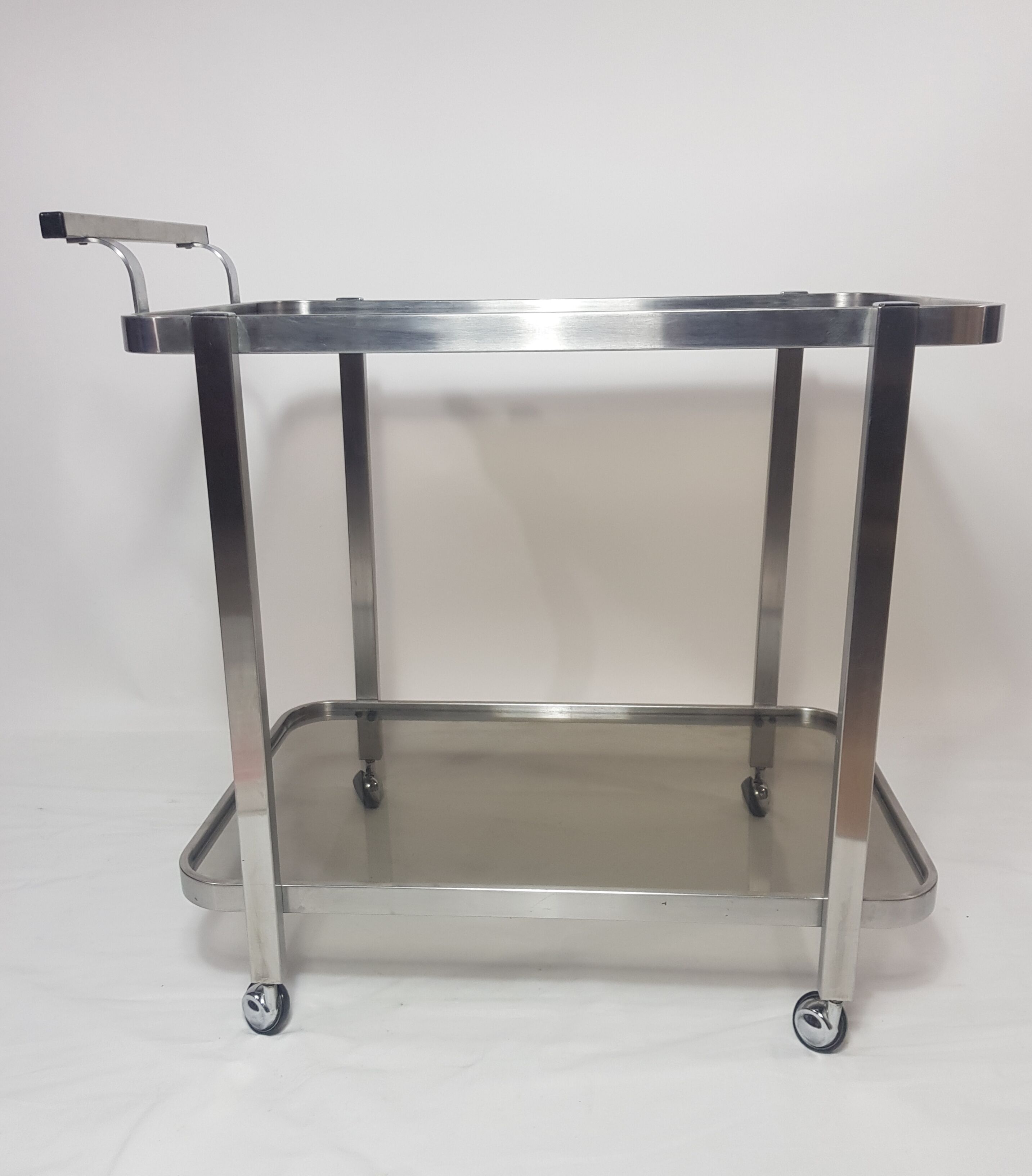 Chariot de service acier brossé et verre fumé années 70