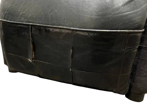 Pair of leather armchairs with marquetry armrests