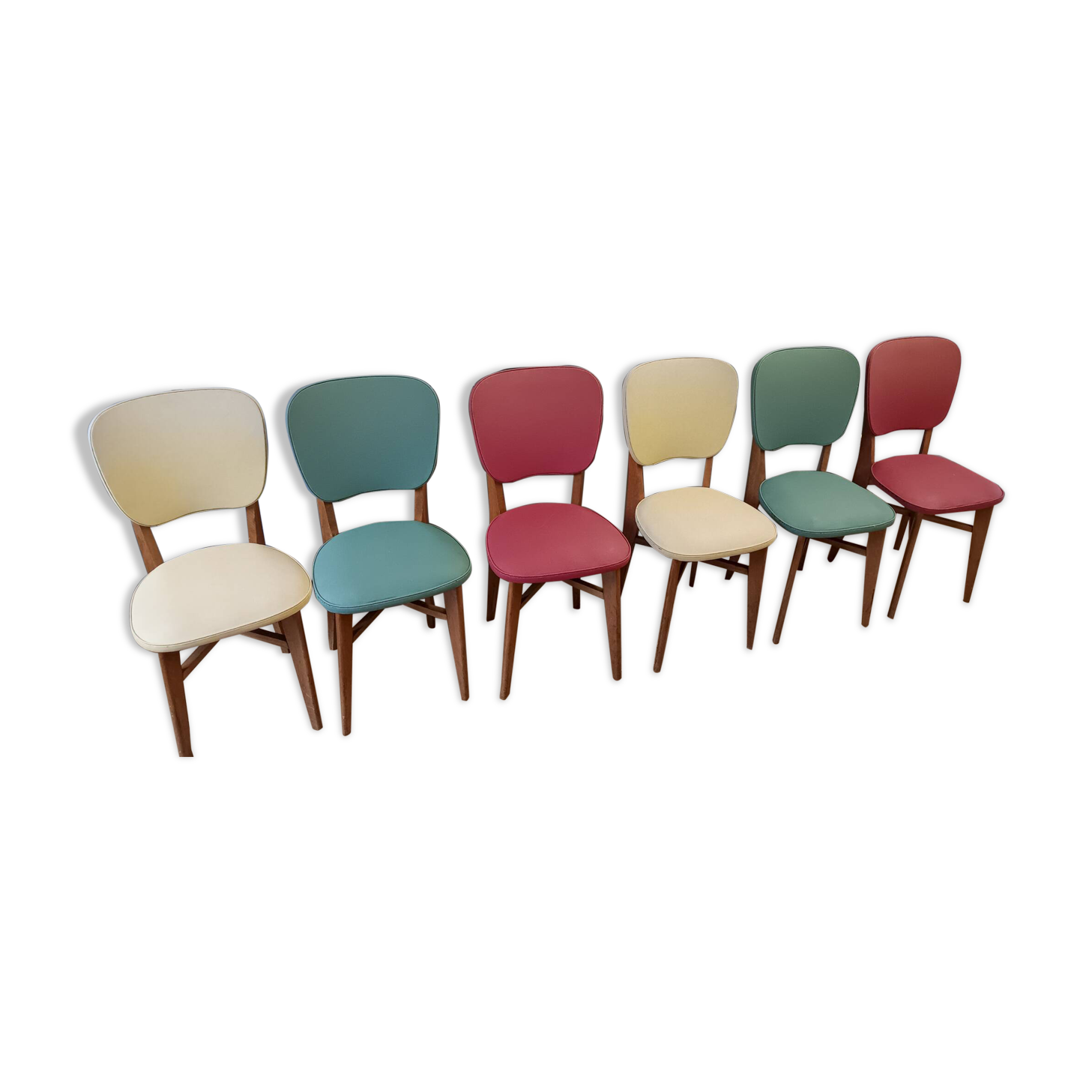 6 vintage chairs from the 50s/60s, wooden structure and skai covering.
