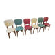 6 vintage chairs from the 50s/60s, wooden structure and skai covering.