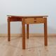 Meticulously crafted vintage pine side table, a masterpiece.