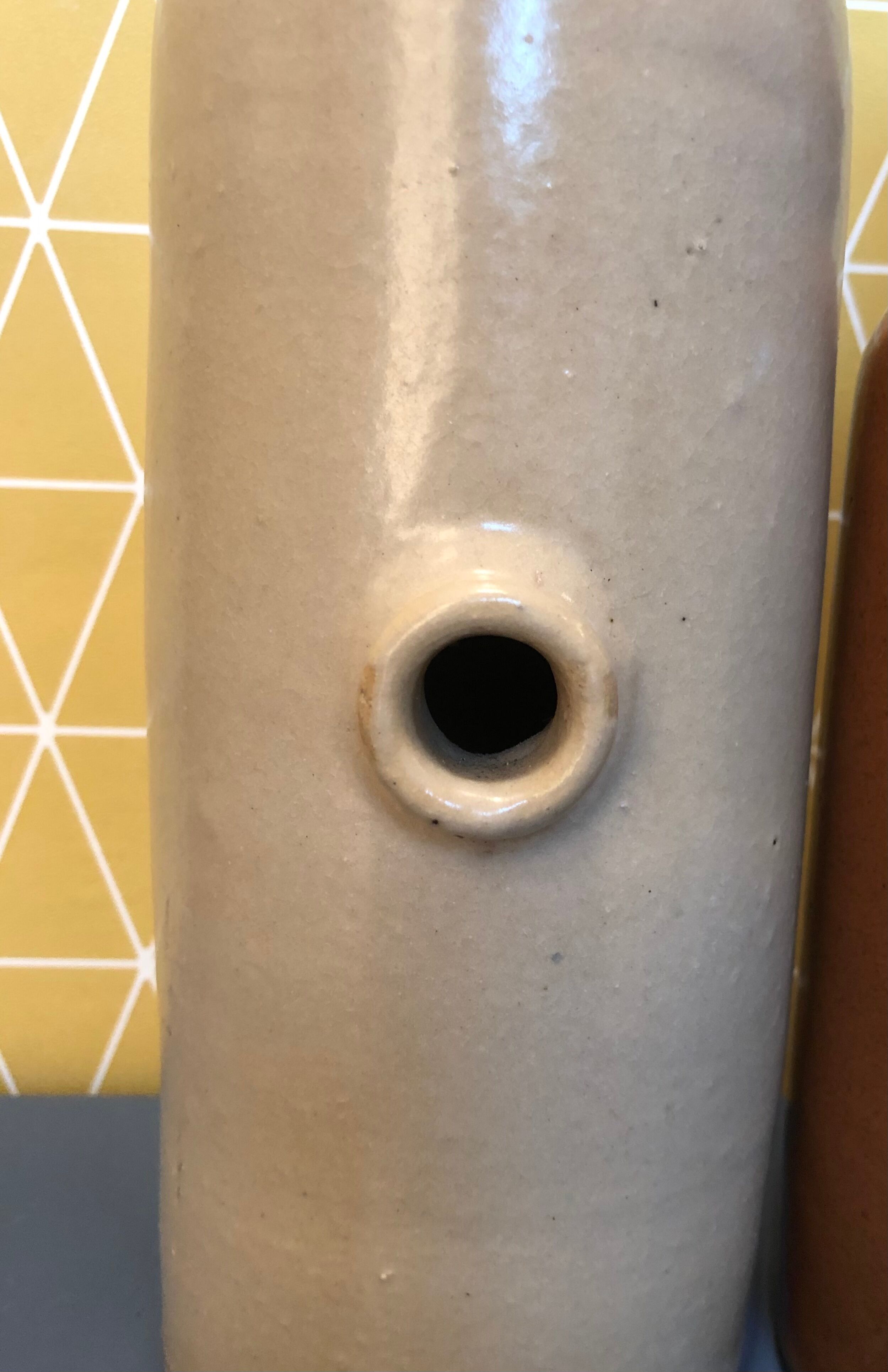 Duo of sandstone bottles