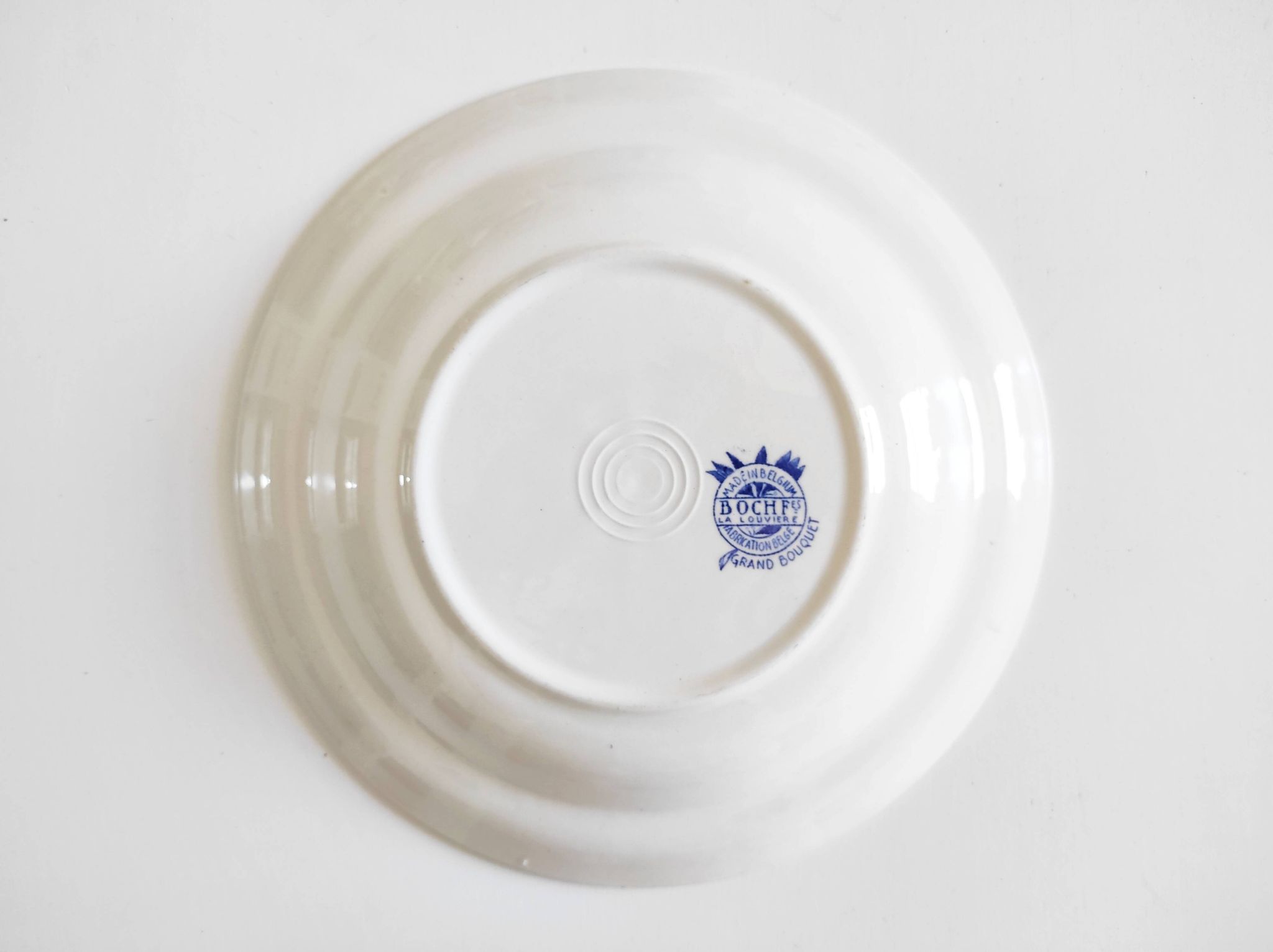 Boch Frères deep plate with large bouquet decoration