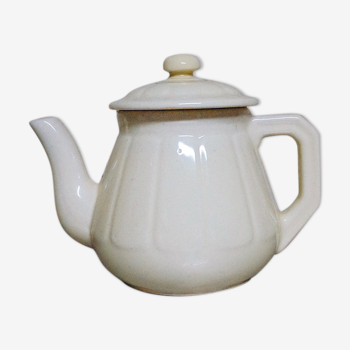 Pale yellow porcelain teapot