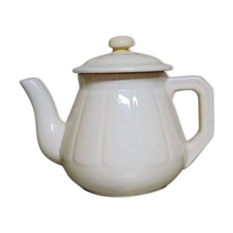 Pale yellow porcelain teapot