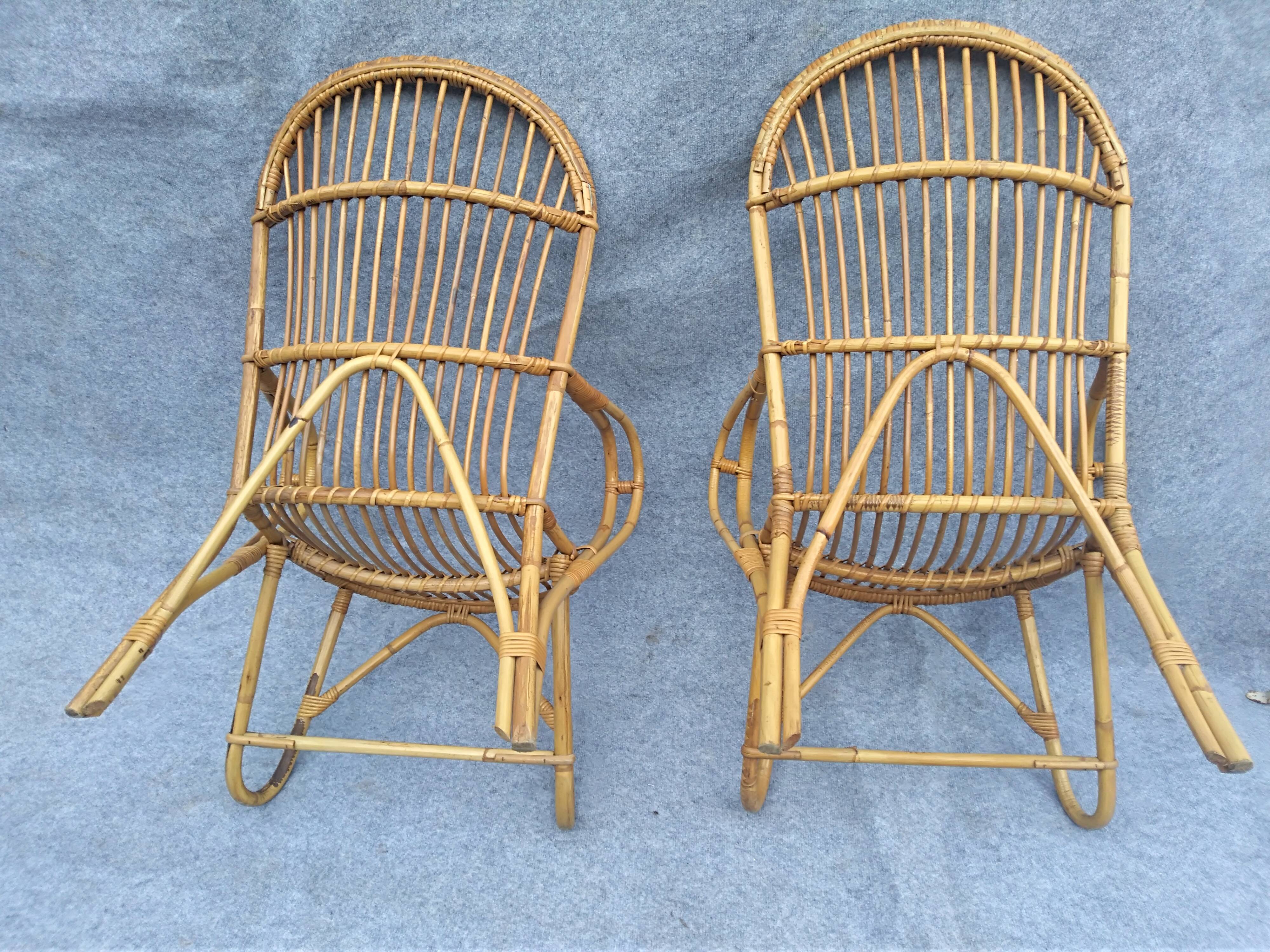 Pair of high-backed rattan armchairs