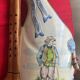 Quimper vase in the shape of a bagpipe, signed and numbered.