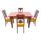 Table with four chairs from the early 20th century