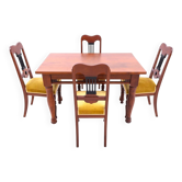Table with four chairs from the early 20th century