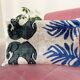Coussin Ikat en velours éléphants persans