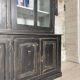 Display cabinet in patinated wood