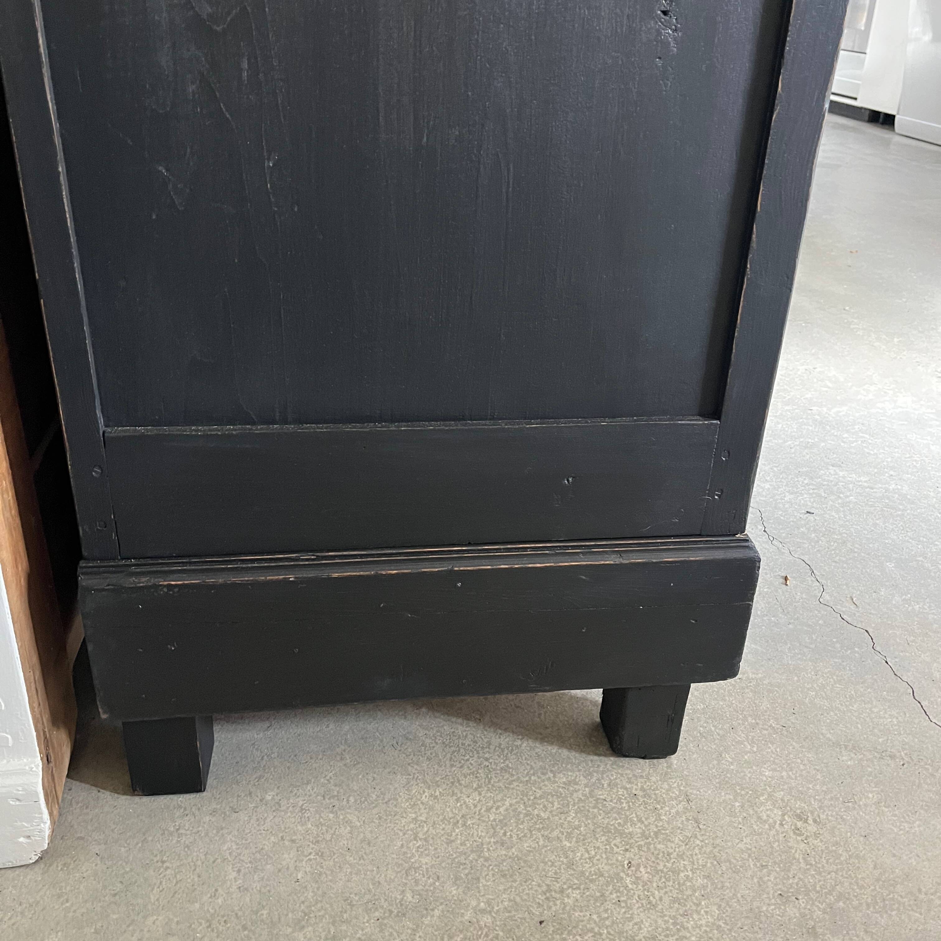 Large black wooden wardrobe