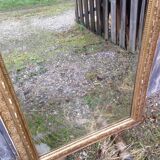 Wooden fireplace mirror and Gilded Louis XVI-style plaster with leaf