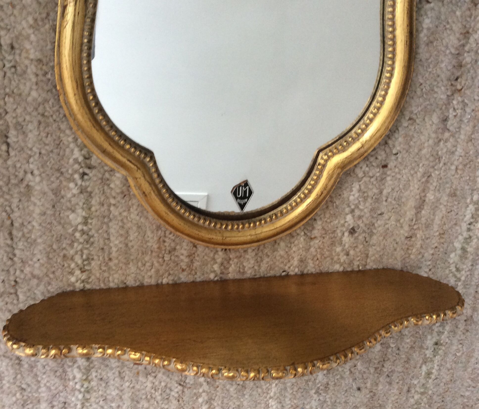 Gilded wooden mirror assembly and its wall console