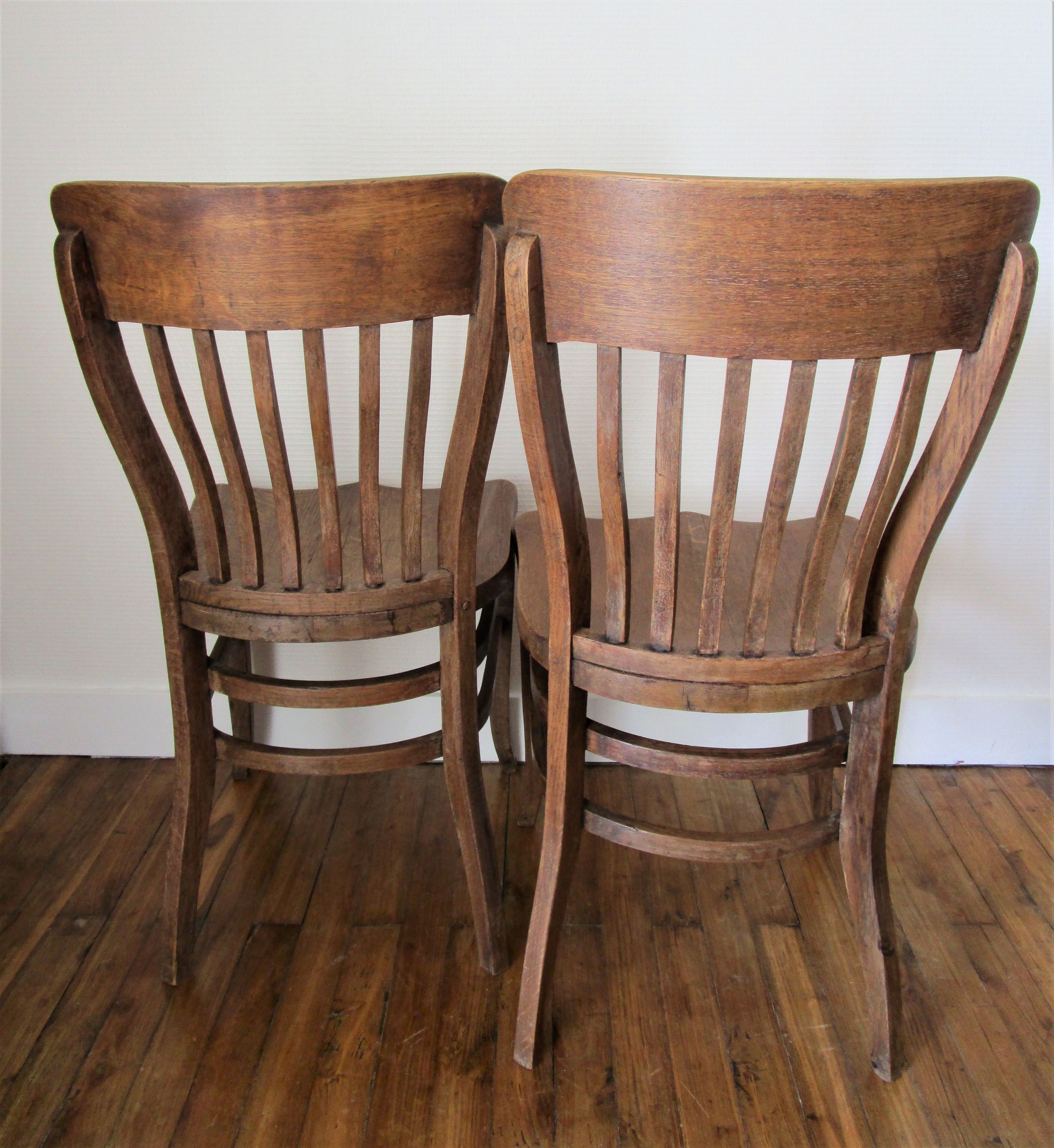 Two chairs solid oak patinated early twentieth century