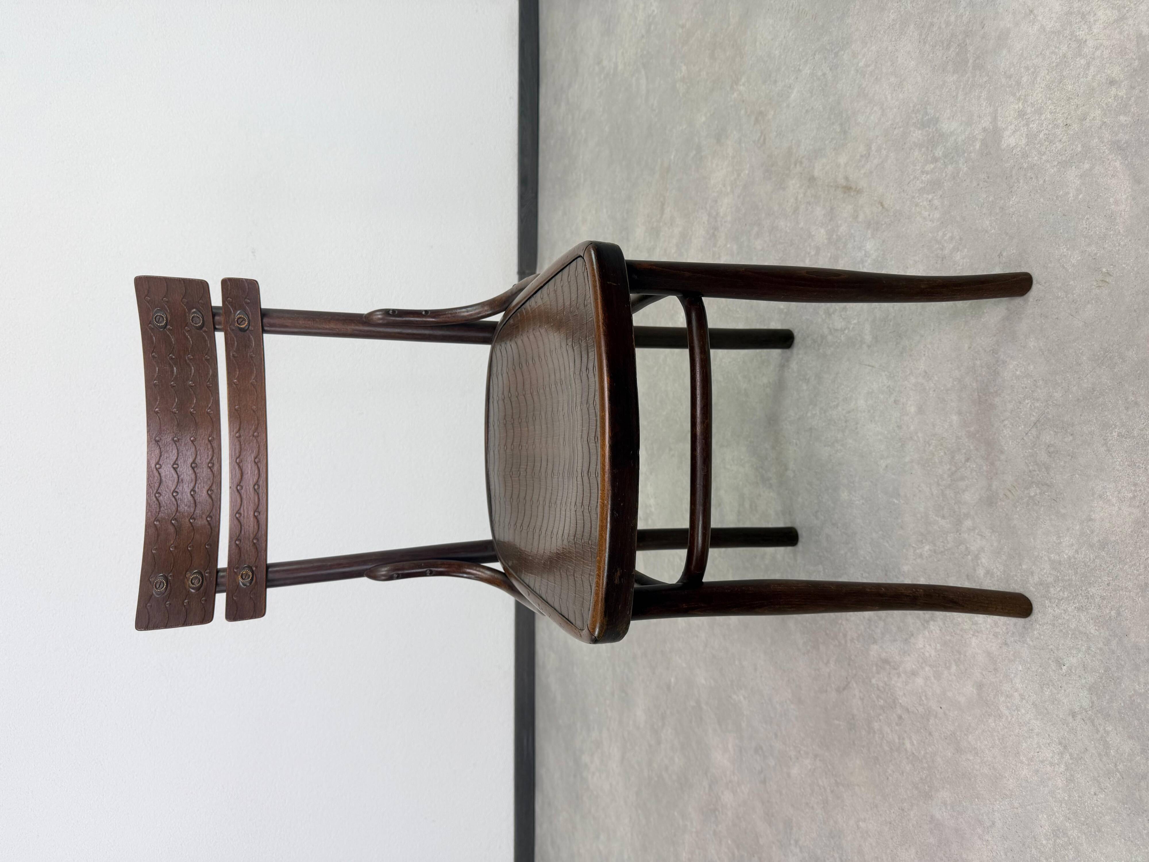 Set of 2 dining chairs by J&J Kohn