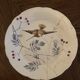 13 decorative plates with hummingbird design in fine earthenware by Mouzin Lecat, 19th century.