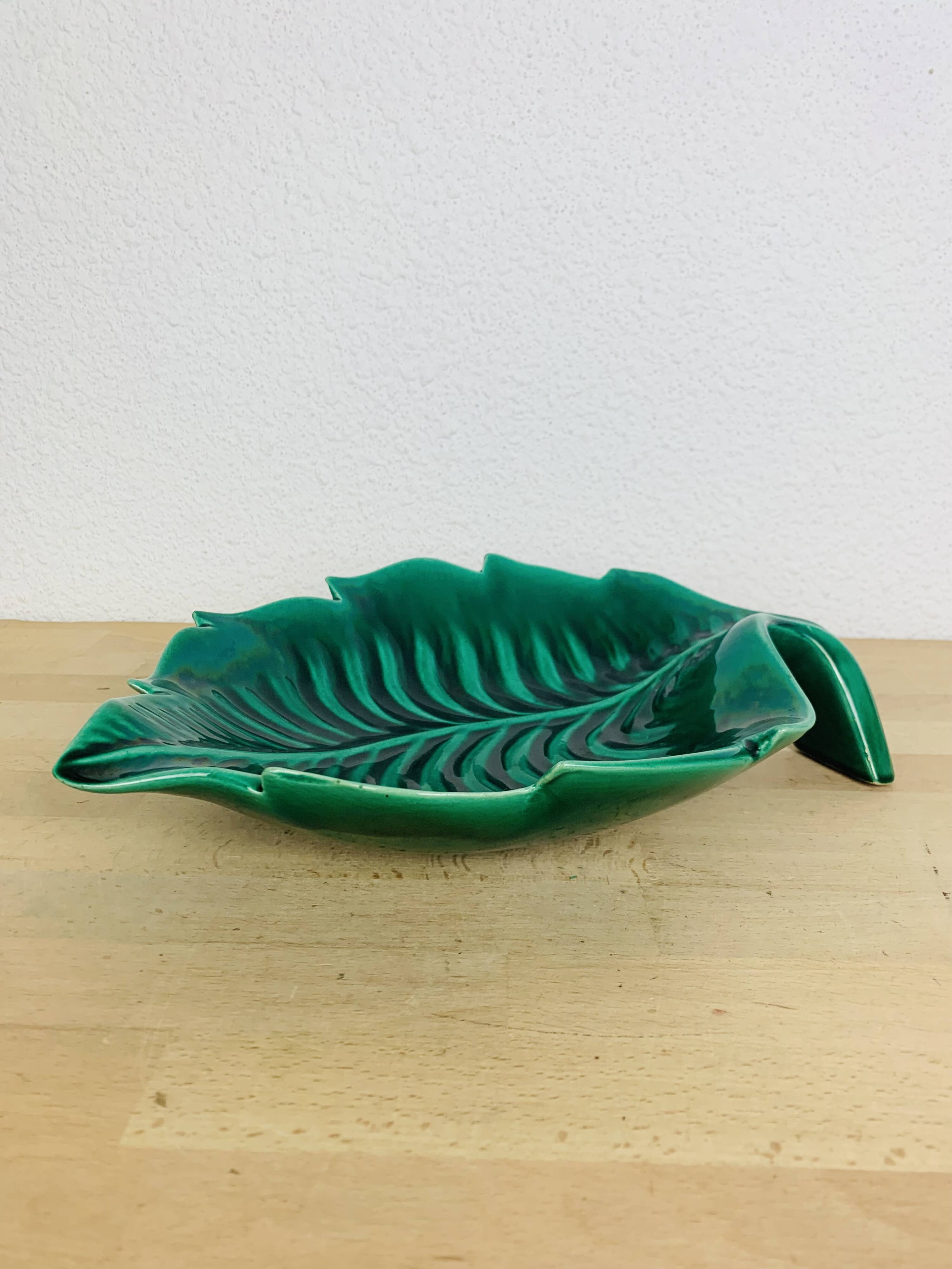 Ceramic cup signed CAB, green leaf, 1950s, slip