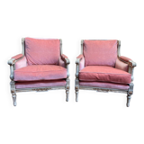 Paire de fauteuils - bergères de style Louis XVI
