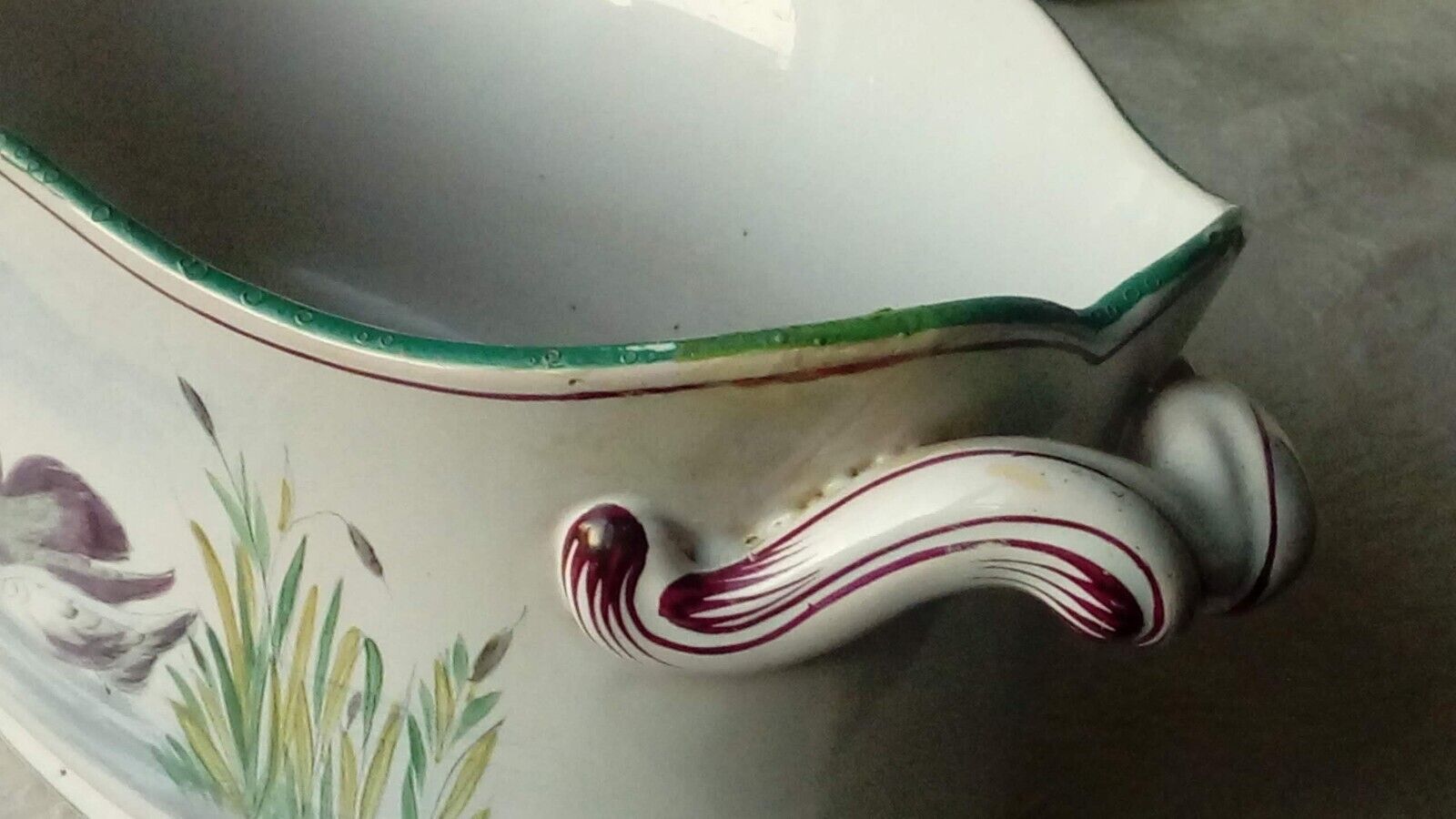 St Clement faience jardiniere with marine and swan decoration, early 20th century.