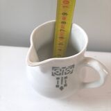 Vintage cream pot with Art Deco pattern and its lid.