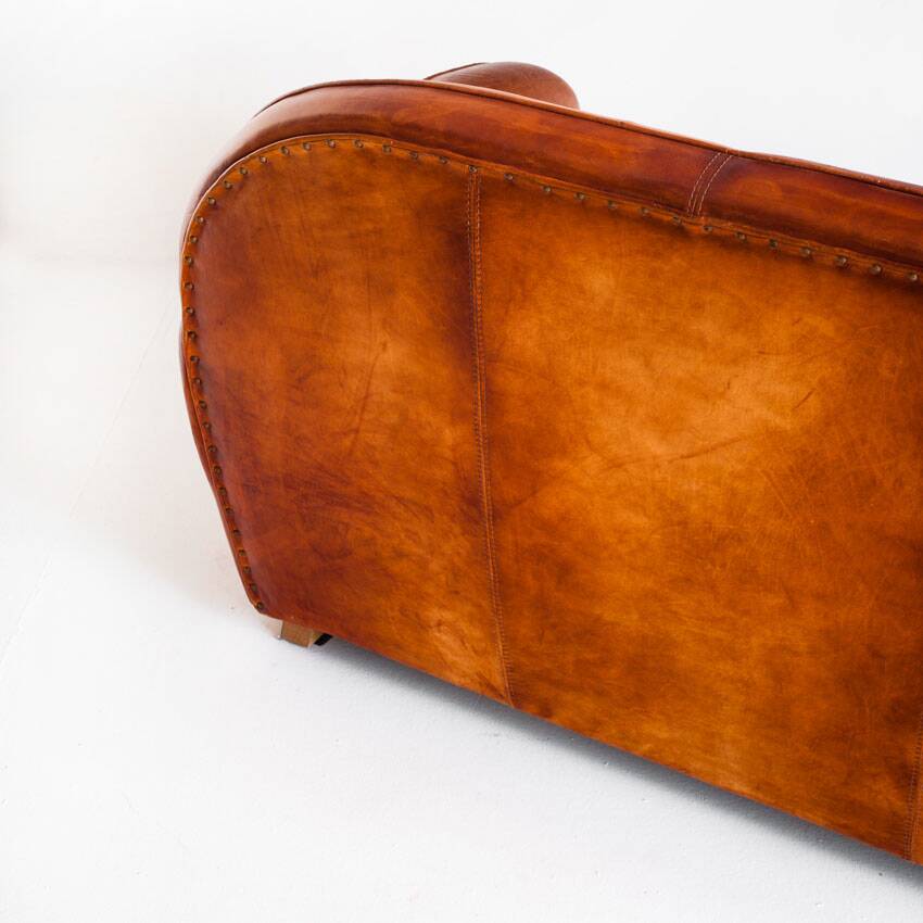 Vintage leather club sofa. Art Deco style. France, 1950s. (sofa convertible into bed)