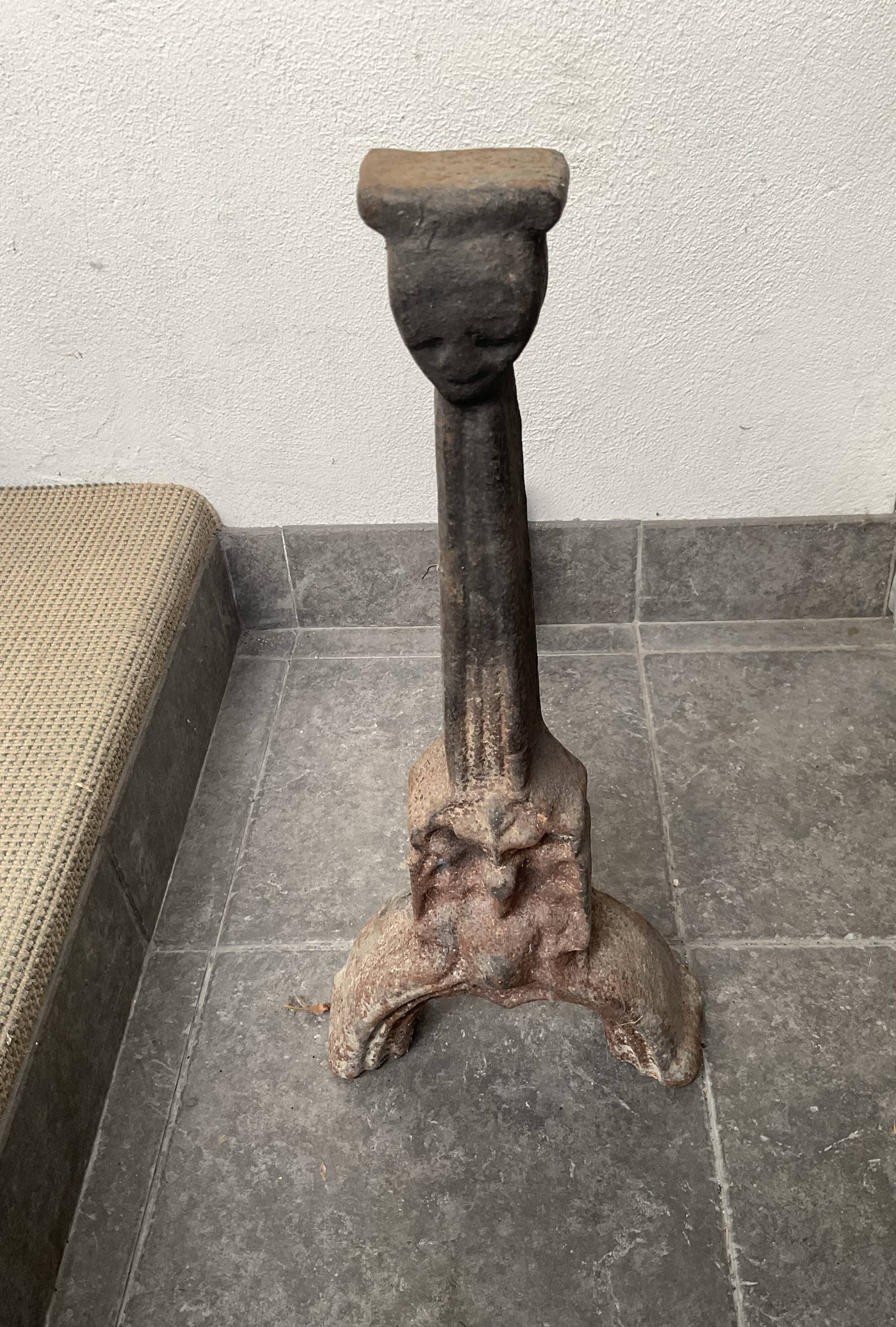 Pair of andirons from the high period with Gothic female heads.