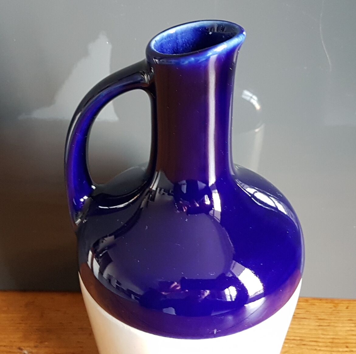 Old ceramic decanter Dolfi vase