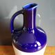 Old ceramic decanter Dolfi vase