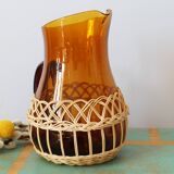 Amber glass decanter dressed in wicker, vintage