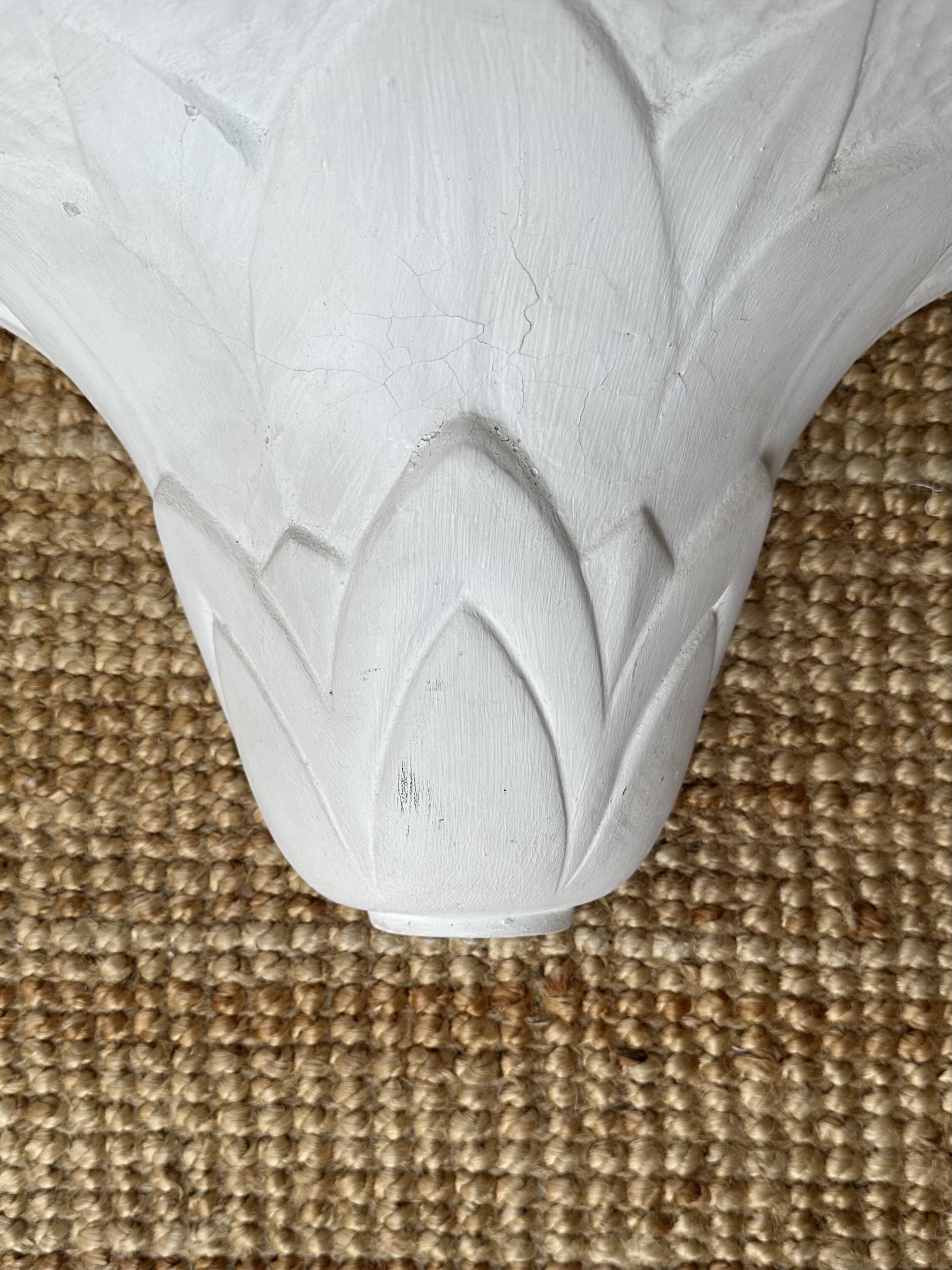 Pair of plaster wall sconces, palmette decoration, 20th century