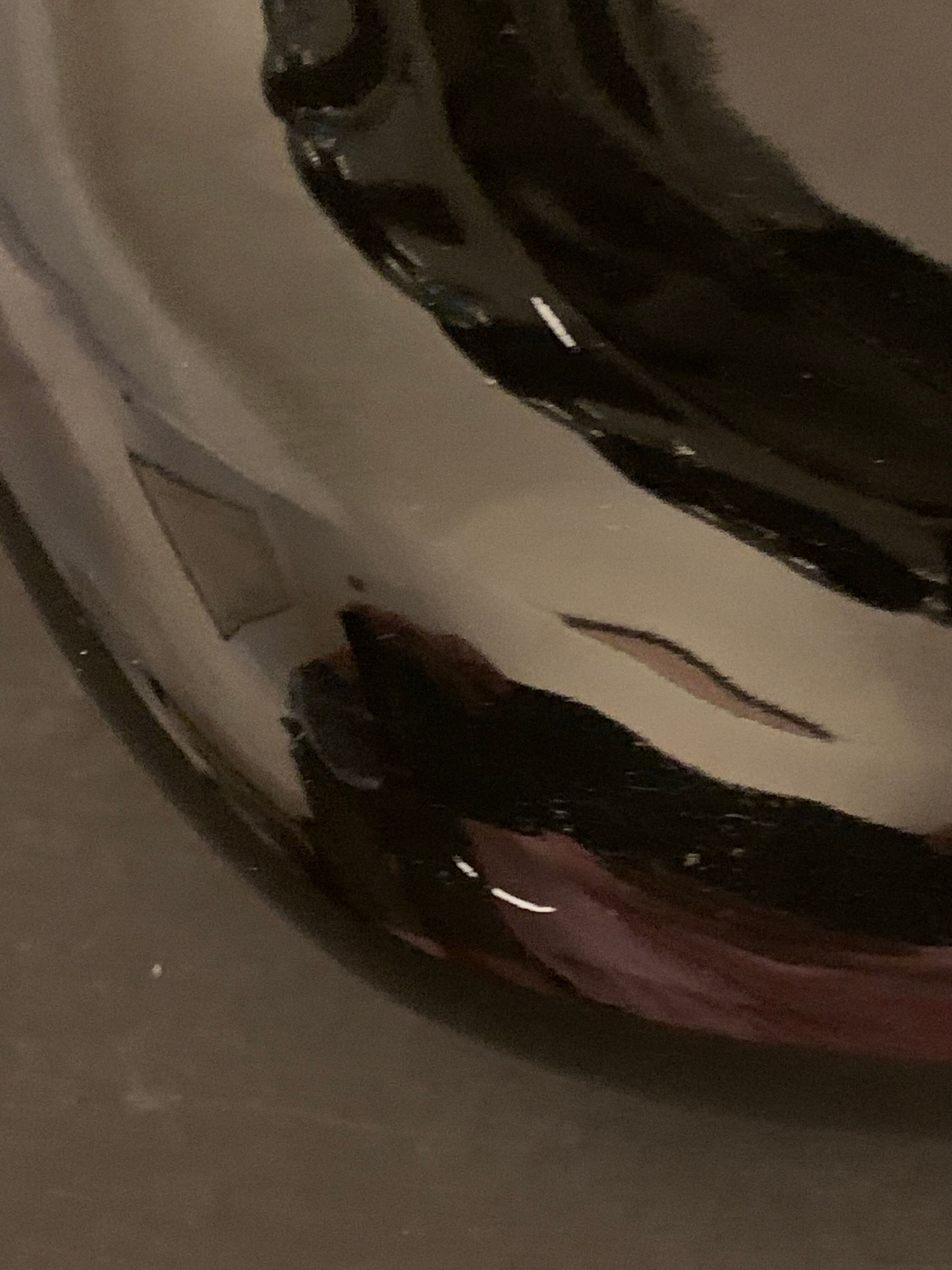 Black ceramic ashtray left hand