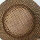 Wall composition of wicker and rope elements.