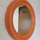 Orange vintage round wall plastic mirror 1980s, space age vanity mirror
