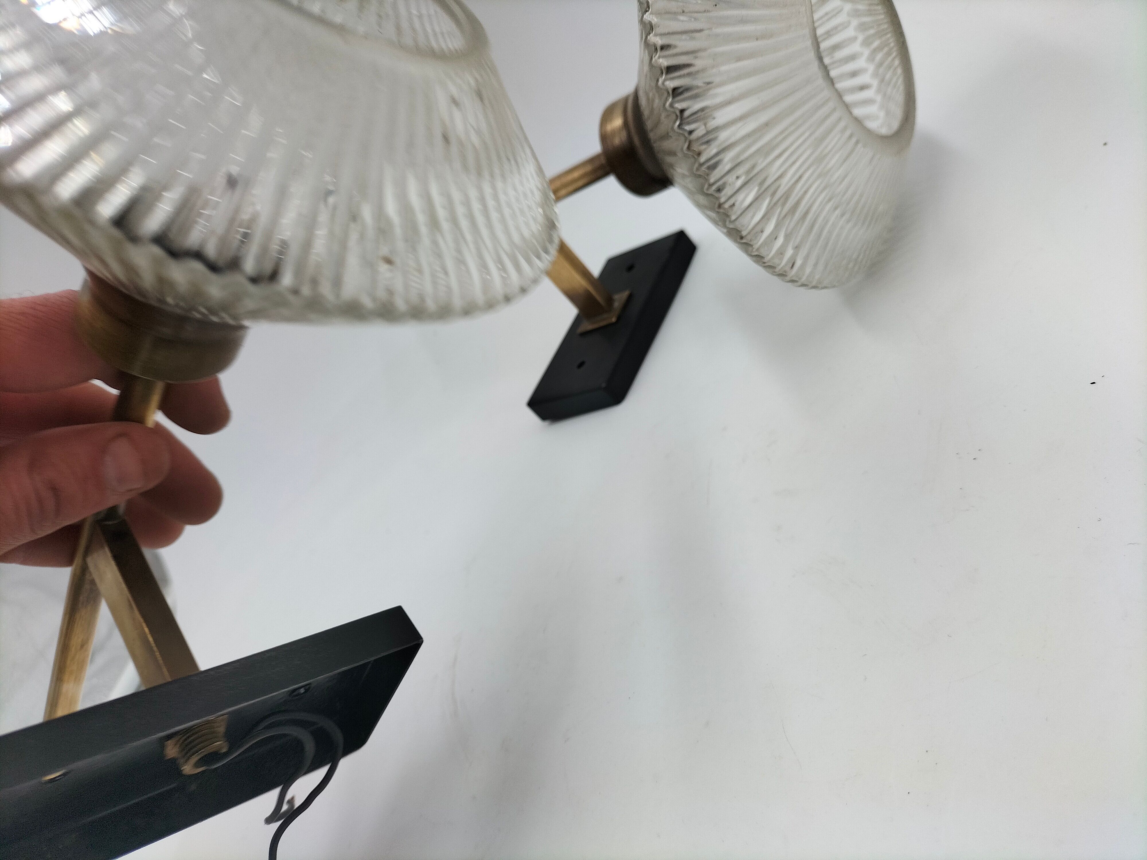 Pair of brass and glass wall lamps