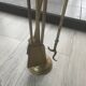 Brass fireplace tool set