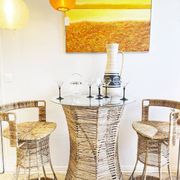 High rattan stool – creation by Roger Coster, 1970