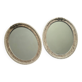 paire de miroirs ovales anciens