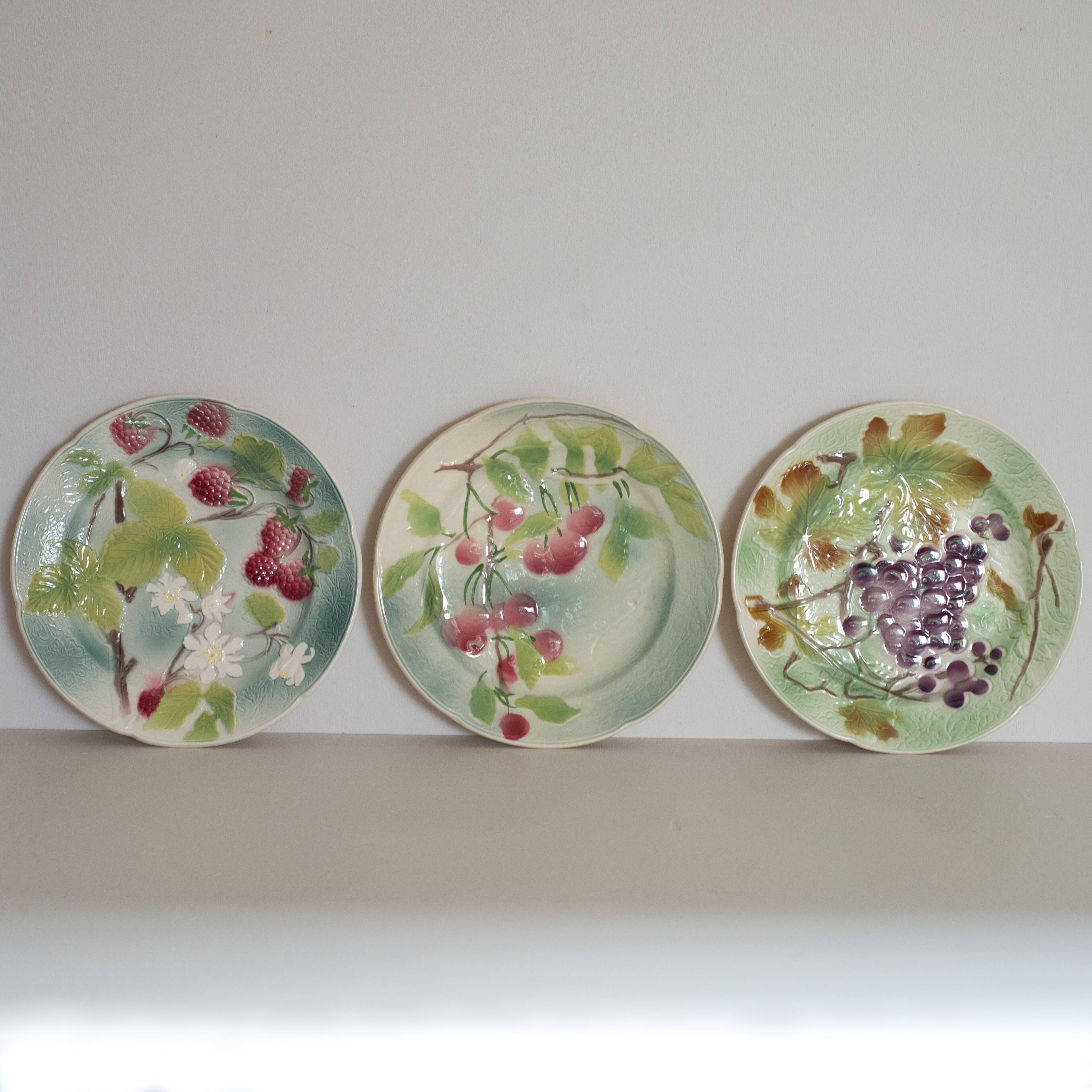 3 antique dessert plates decorated with fruit in slurry of Saint Clement