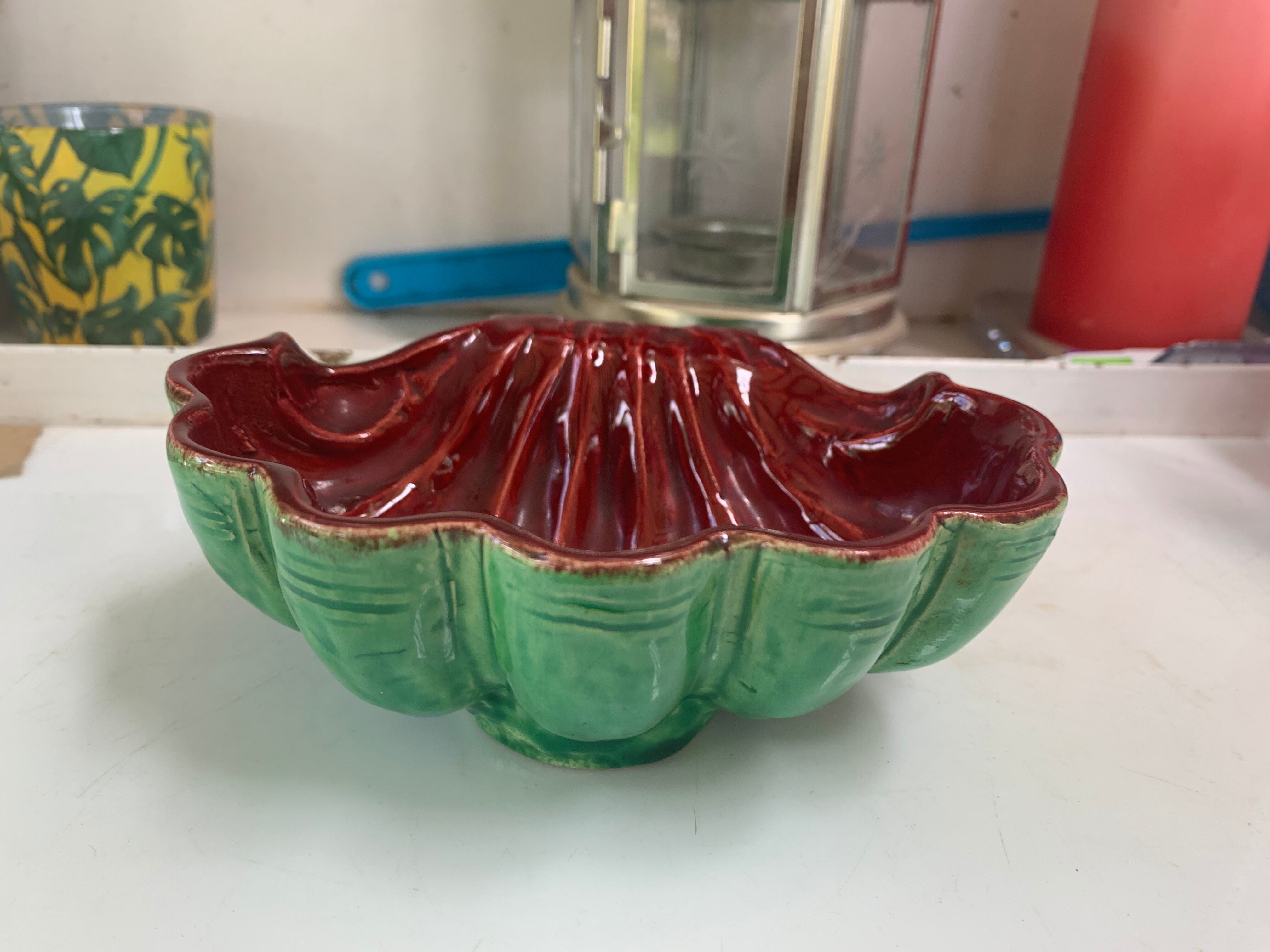 Green and red vintage dabbling enamelled ceramic shell
